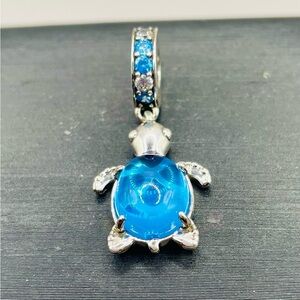 Blue glass sea turtle dangle charm with rhinestones. 925 sterling silver. Cute